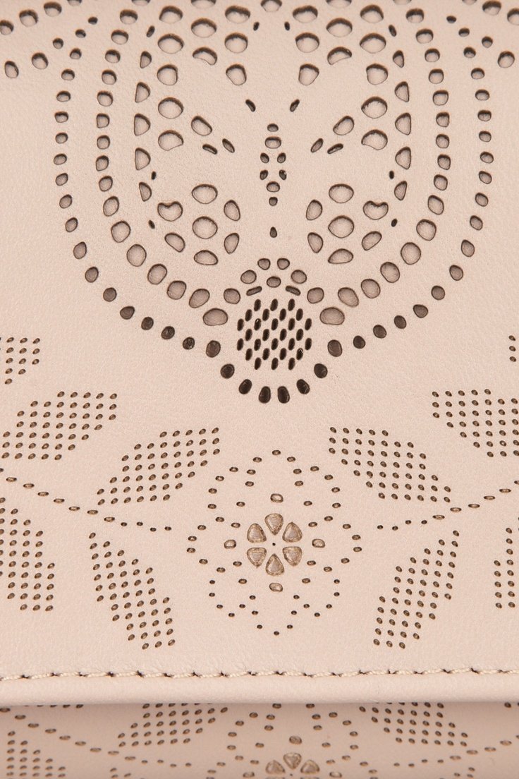 Фигурная перфорация кожи