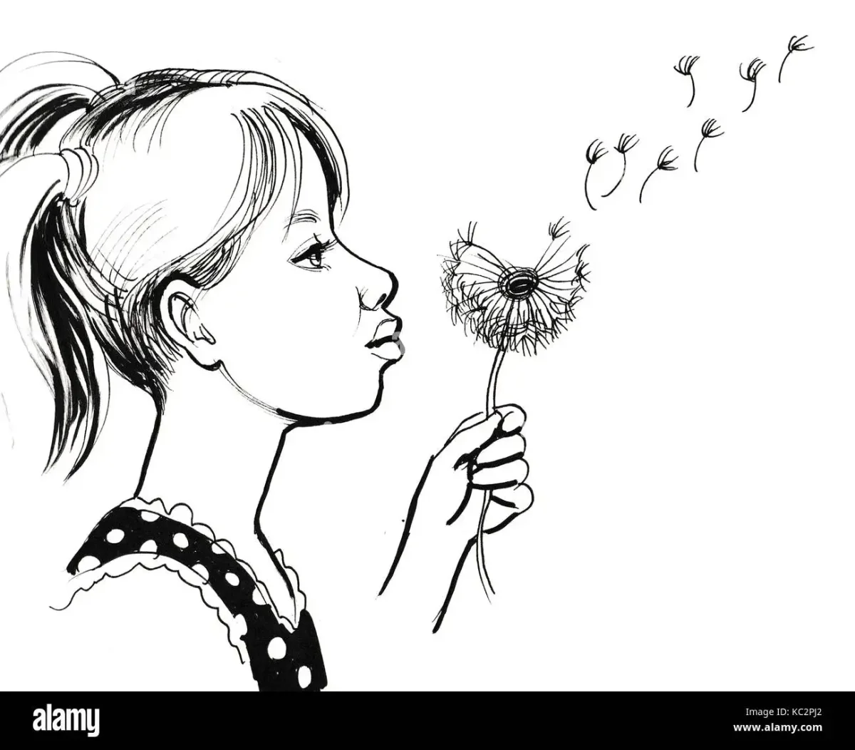 Ребенок дует на одуванчик