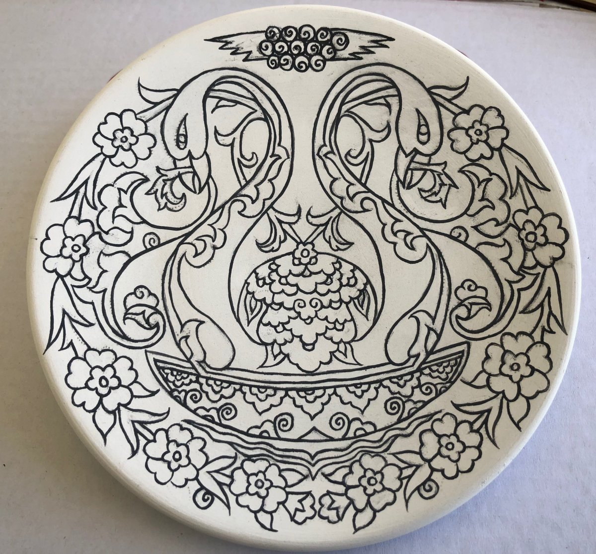 Колеграфический орнаментом на посуде