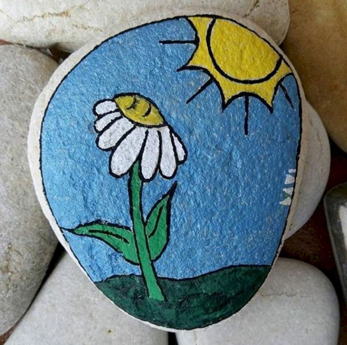 Рисование на морских камушках