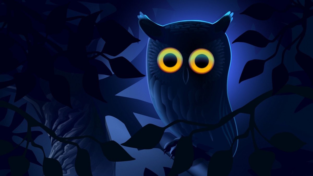 Сова со светящимися глазами