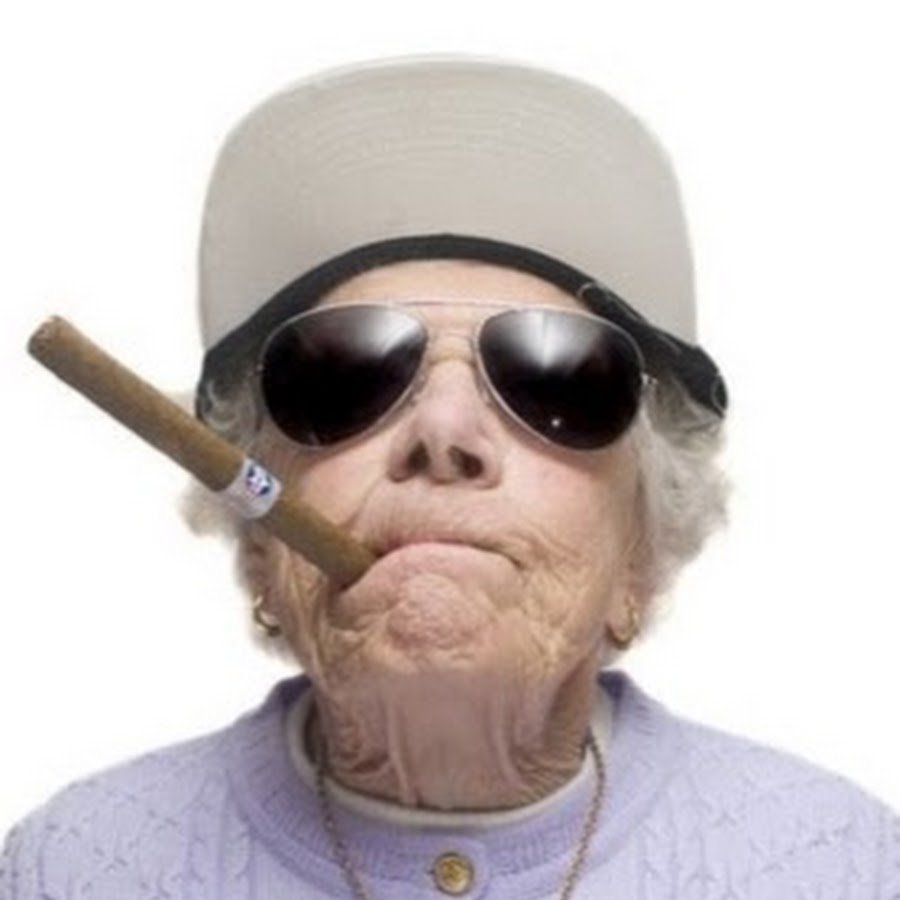 Бабушка в чёрных очках и пистолетом