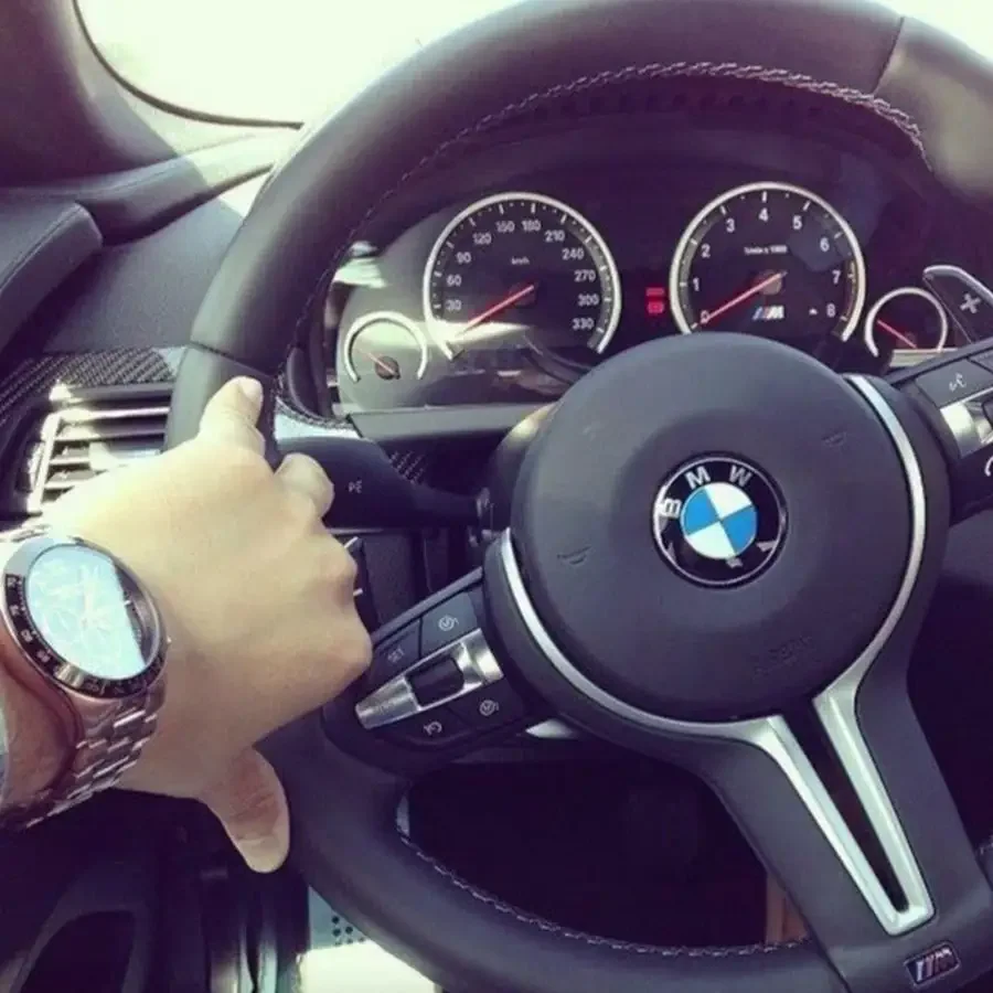 За рулем БМВ х7