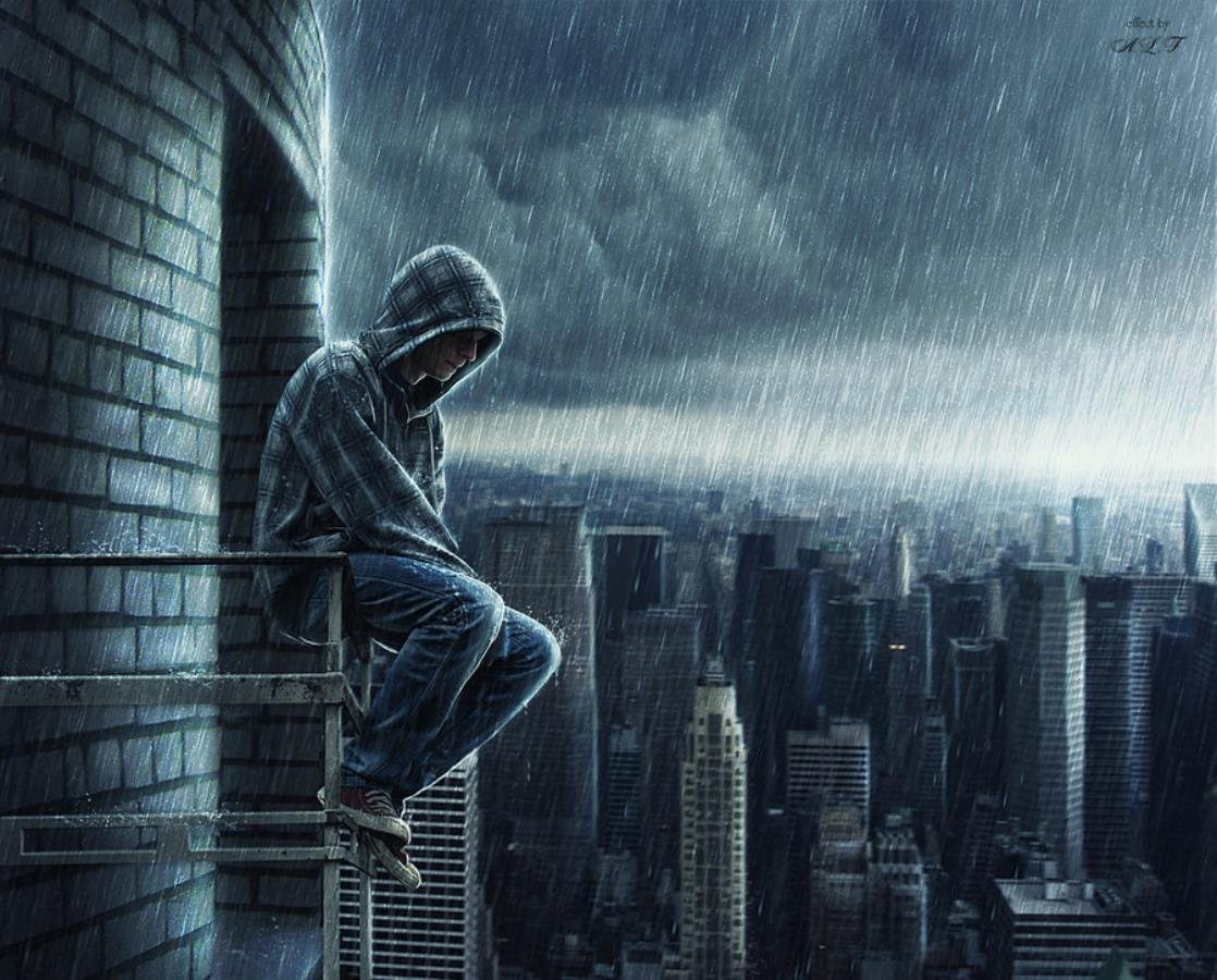 Парень под дождём в капюшоне