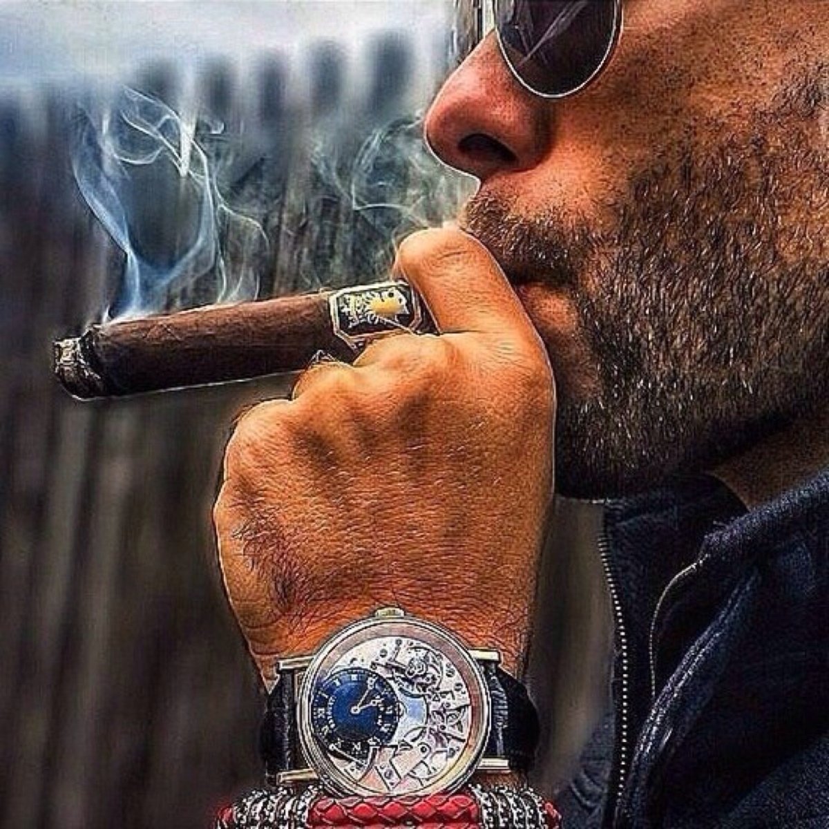 Мужчина с сигарой